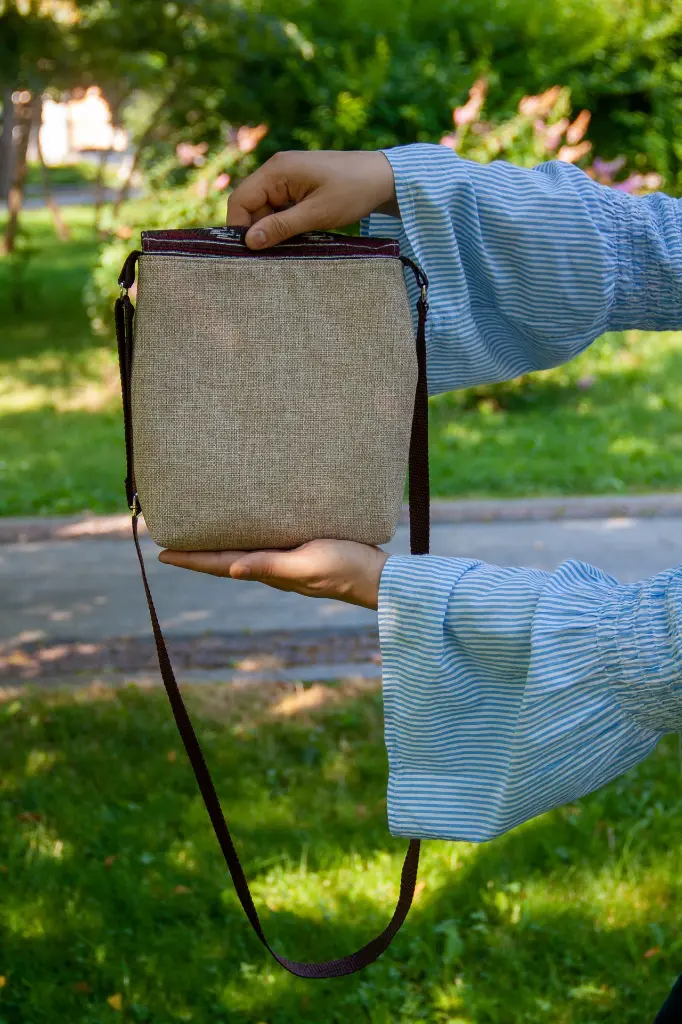 Crossbody Bag Brown Ethnic Beige M in Hand Back.webp